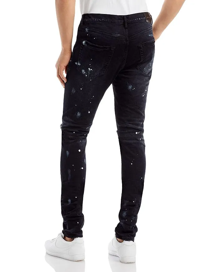 Black Skinny Jeans with Ripped Knees and Purple Brand Paint Splatter