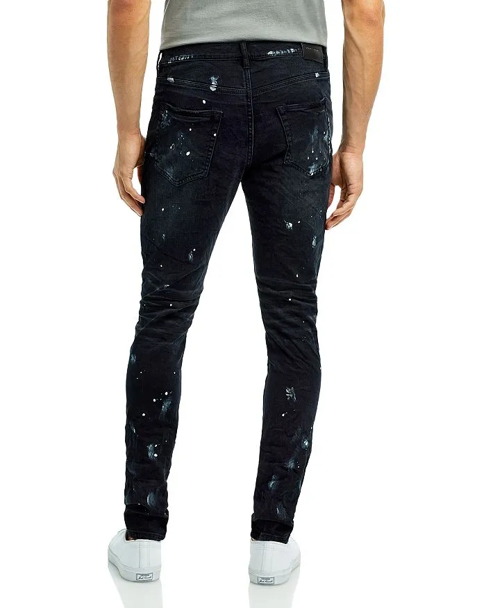 Black Skinny Jeans with Ripped Knees and Purple Brand Paint Splatter