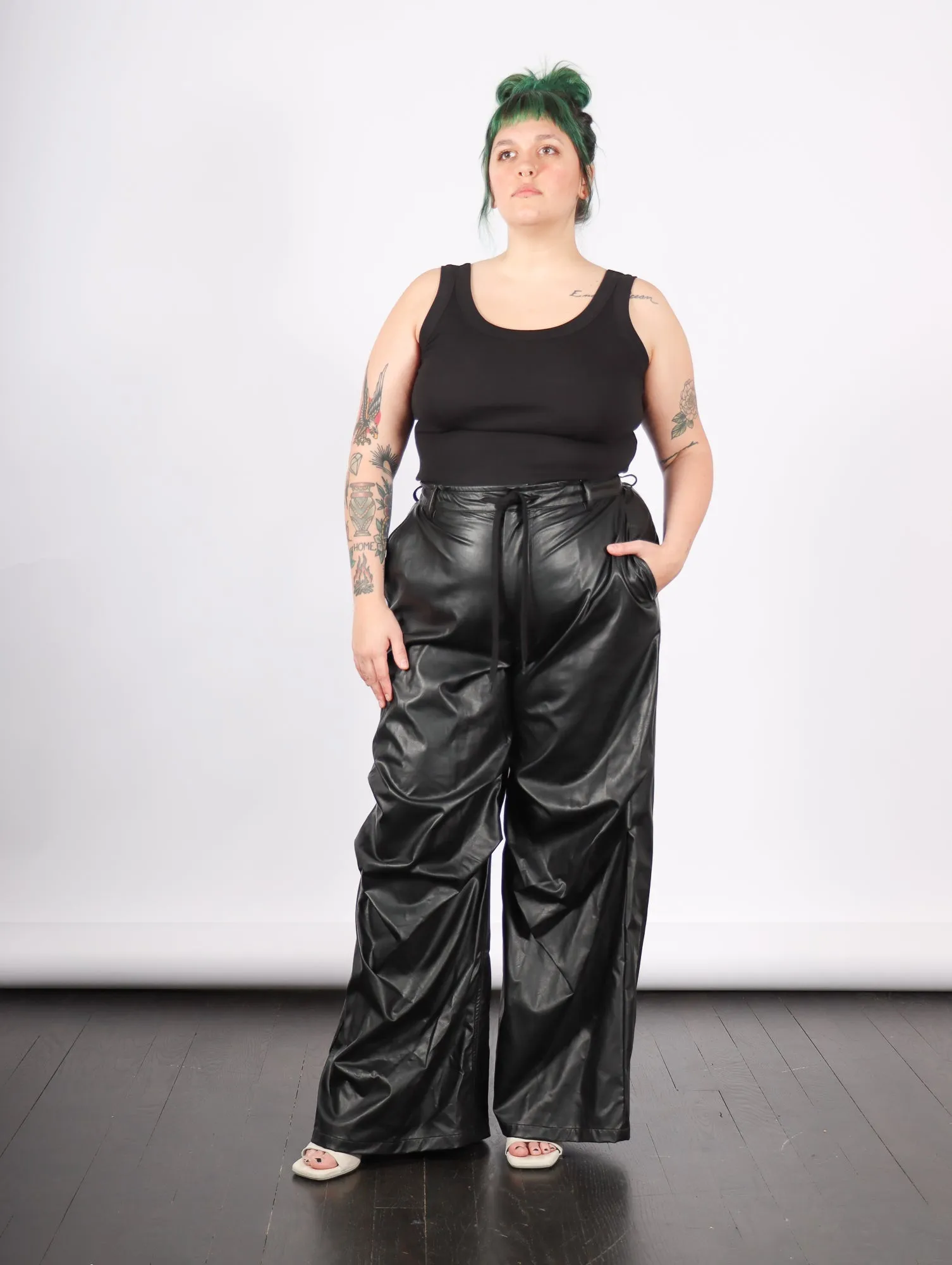 Pants in Black Faux Leather by MM6 Maison Margiela