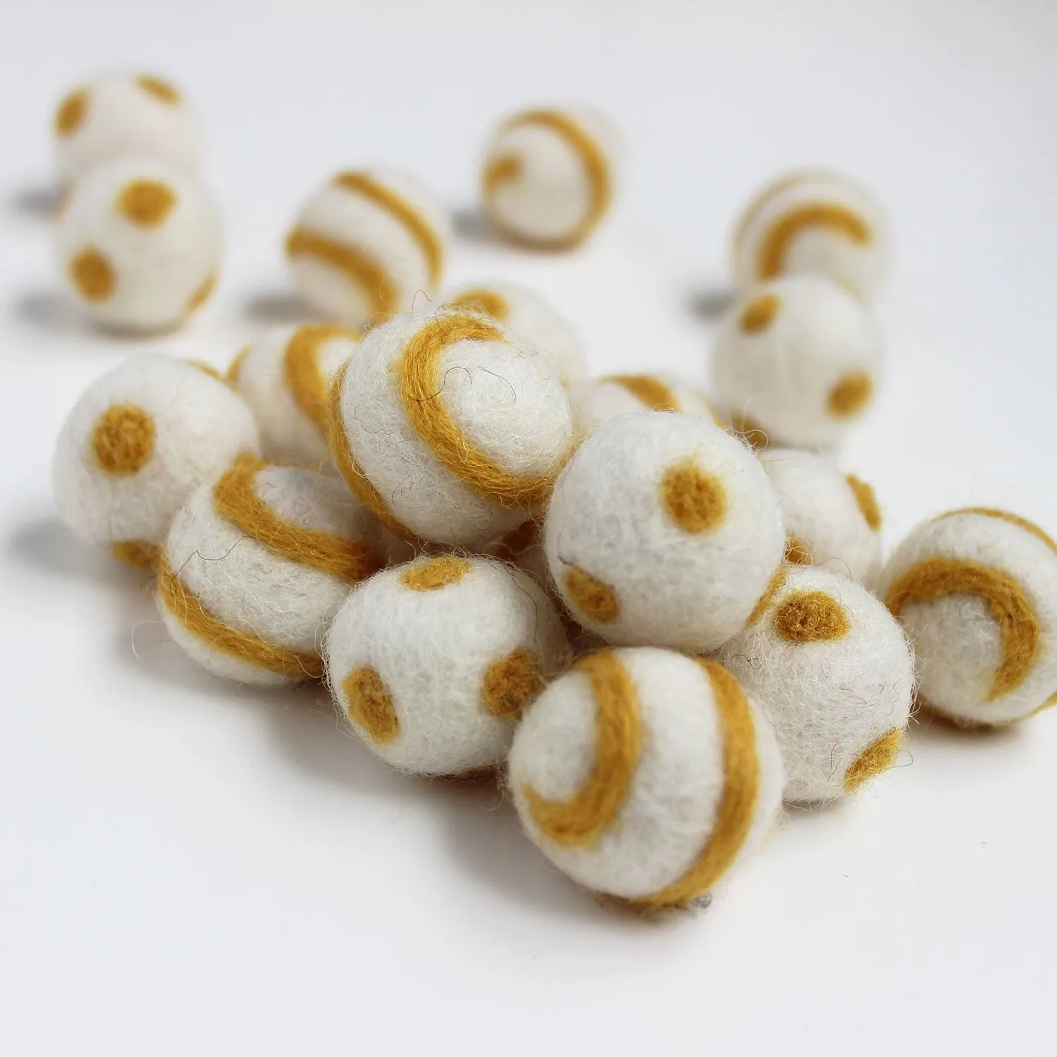 Polka Dot Swirl Felt Balls Gold On White