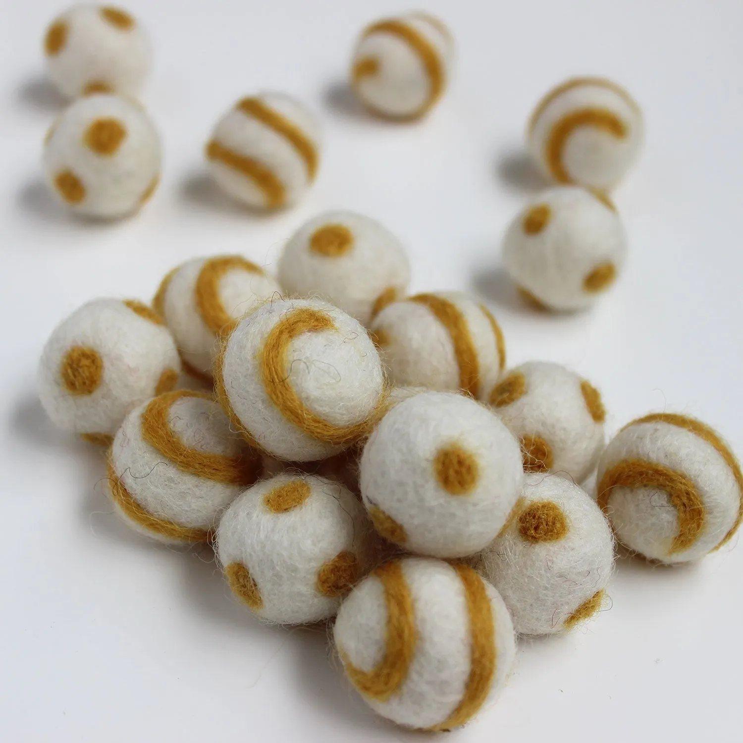 Polka Dot Swirl Felt Balls Gold On White